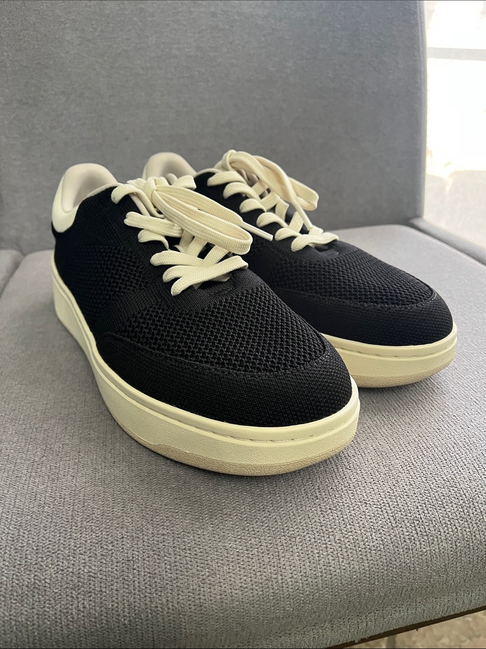 Rothy’s The Court Sneaker Black Knit with Cream Sole and Laces